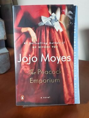 Jojo Moyes "The Peacock Emporium" Paperback - Red Cover (11)